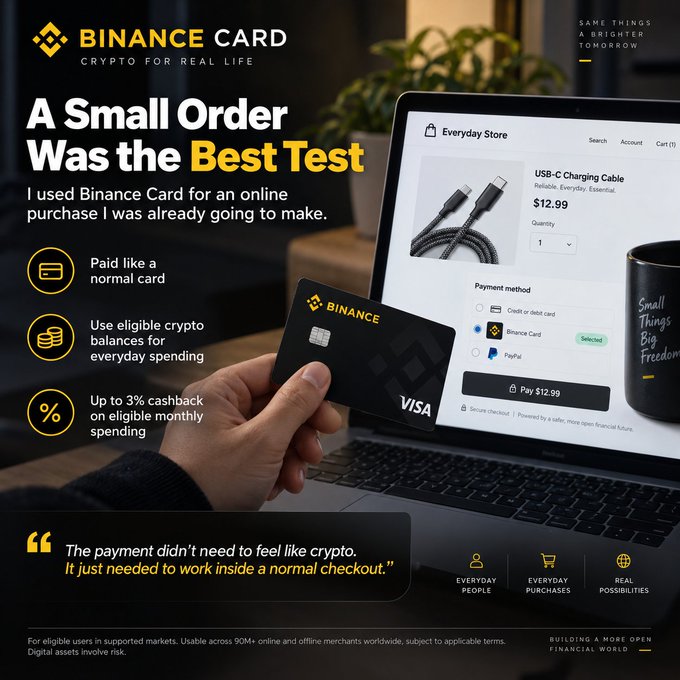 The image shows a hand holding a black Binance Visa Card in front of a laptop displaying an "Everyday Store" checkout page for a $12.99 USB-C charging cable, with payment via "Binance Card" selected. The promotional text reads "Binance Card: Crypto for Real Life — A Small Order Was the Best Test," highlighting 3% cashback on eligible spending and emphasizing that the payment worked seamlessly within a normal checkout flow.

The image directly illustrates the post's premise by showing exactly the scenario described: using the Binance Card for a small, everyday online purchase rather than a dramatic transaction, visually reinforcing the point that crypto spending should feel like any other checkout experience.