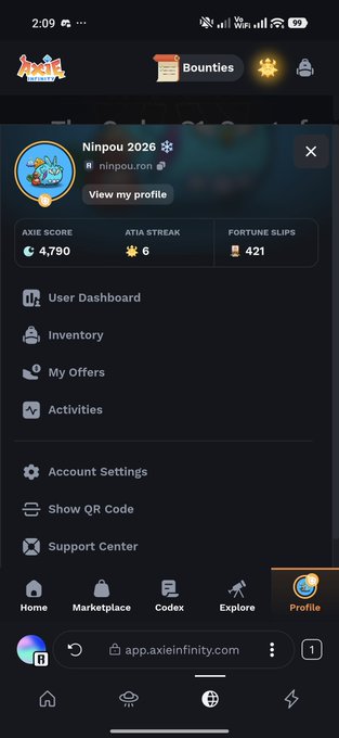 A mobile screenshot of the Axie Infinity app showing the user profile 'ninpou_ron' with an AXIE SCORE of 4,790, an ATIA STREAK of 6, and 421 FORTUNE SLIPS, along with menu options like Inventory, My Offers, and Activities.