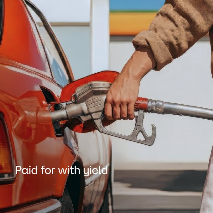 The image shows a person filling up their car with gas at a pump, while text is displayed above them that says "@merkl_xyz rewards, offering strategies for your choice of stablecoin positions. Supply to HEMI/USDT or Hemi/USDC.e pools for boosted yield." The person's hand is holding the nozzle of the gas pump, and there are two cars visible in the image - one being filled with gas while the other remains empty.
