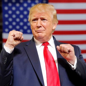 Donald Trump, with his fists raised in front of an American flag, is featured in an image related to the news that retail investors lost $3.8 billion on a TRUMP memecoin, while Trump himself reported $636 million in income from it.