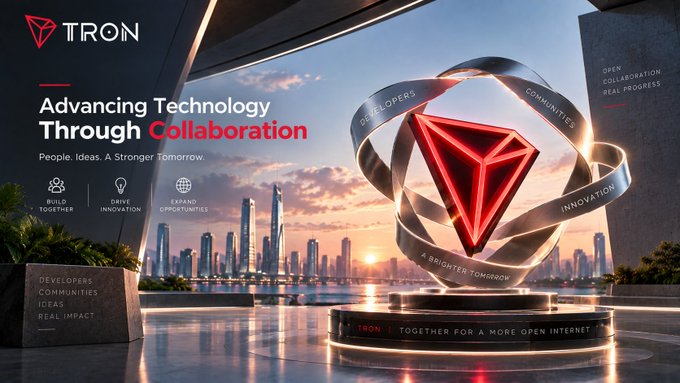 A promotional banner for TRON with the tagline 'Advancing Technology Through Collaboration' featuring a glowing red TRON logo against a city skyline.