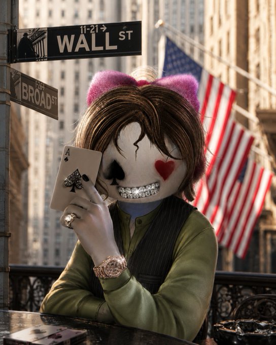 A masked figure with pink ears and shaggy brown hair hides an Ace of Spades behind a Wall Street sign, with an American flag in the background. The image captures the post's warning about the "evil eye" (nazar) on the market, playfully suggesting the market is performing well despite superstitions and encouraging followers to research WL opportunities at low cost.