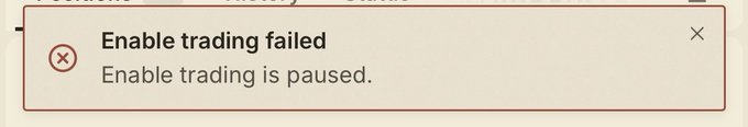 An error message popup displays 'Enable trading failed. Enable trading is paused.'