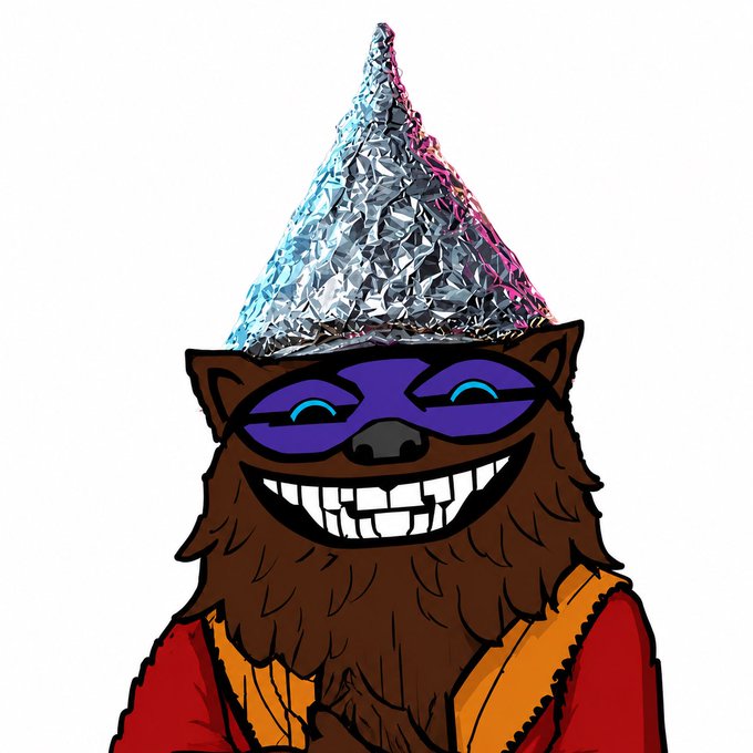A cartoon illustration of a brown furry creature wearing a purple eye mask and a tall silver foil party hat, smiling widely with prominent teeth.