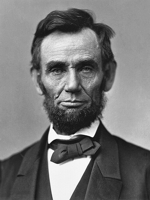 This is a portrait of Abraham Lincoln, whose image is printed on the penny, which is a small amount of money to throw away.