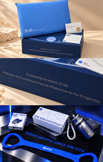 A collage of three images showing HTX promotional merchandise: a blue welcome package labeled 'B.AI' with text 'Accelerating the Advent of AGI', a long blue box with matching text, and a 13th anniversary kit featuring a logo display, metal bottle, and blue wrench-shaped item.