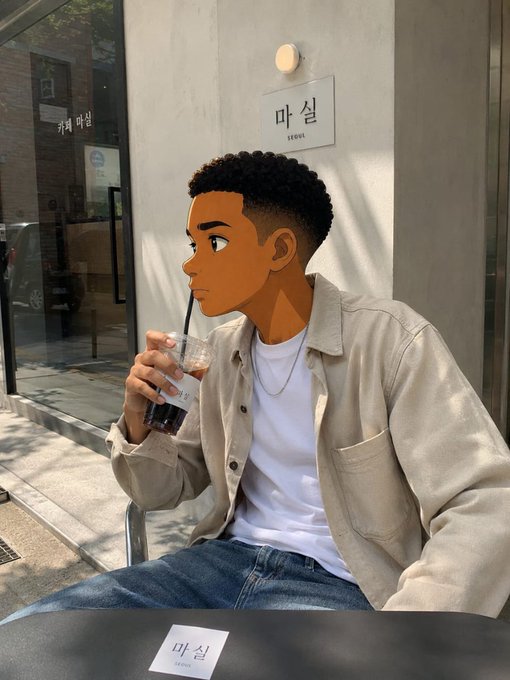 The image features a man sitting at an outdoor table with a drink in his hand. The man has short hair and is wearing a white shirt. He appears to be enjoying his time, possibly taking a break from work or simply relaxing outdoors. In front of him on the table are two collectible plush toys, adding a playful touch to the scene. 

The image also contains text that reads "Gm Ct. What happens when a crypto-powered mindfulness and well-being ecosystem meets collectible plush toys? @timesoulcom is building exactly that, combining the TimeSoul App, mindfulness tools, and connected collectible plush companions into one unique experience". This suggests that there might be an event or promotion related to these collectibles in progress.
