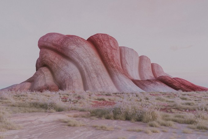 A surreal pink-toned landscape features a large, rippled red rock formation rising from a sparse, dry grassland under a pale sky.