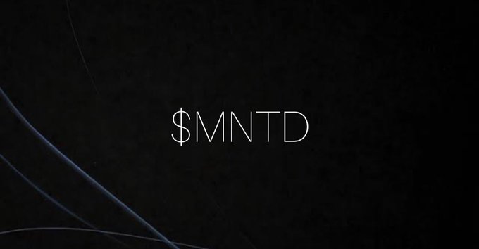 A dark, minimalist background with subtle blue light streaks displays the text '$MNTD' in white centered on the screen.