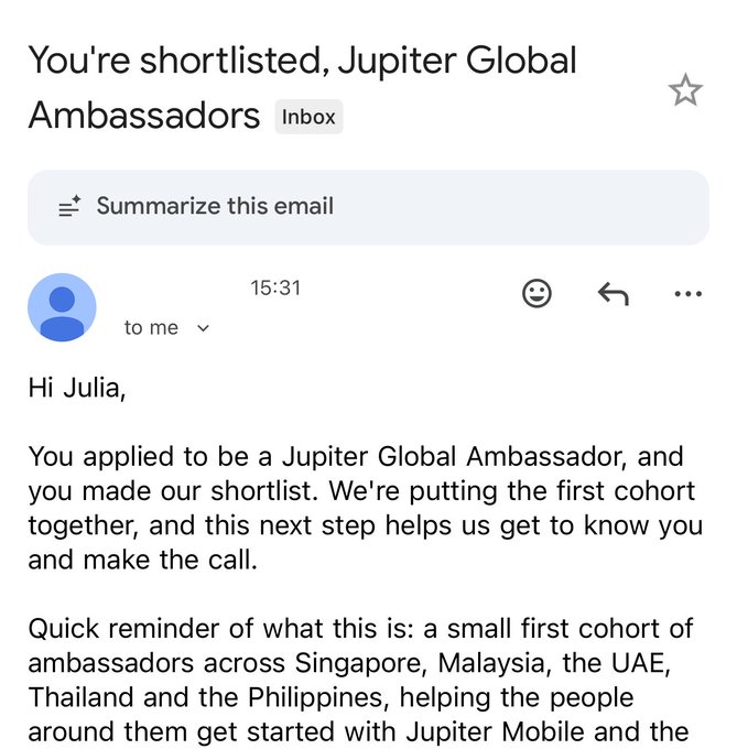 A screenshot of an email confirming that Julia has been shortlisted for the Jupiter Global Ambassadors program. The email notes that the first cohort is being formed across Singapore, Malaysia, the UAE, Thailand, and the Philippines, supporting the post's point about the geographic eligibility requirement.