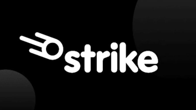 The image displays the Strike logo in white on a black background. The logo is referenced in the post asking for advice on choosing between Strike or River for a Bitcoin account.