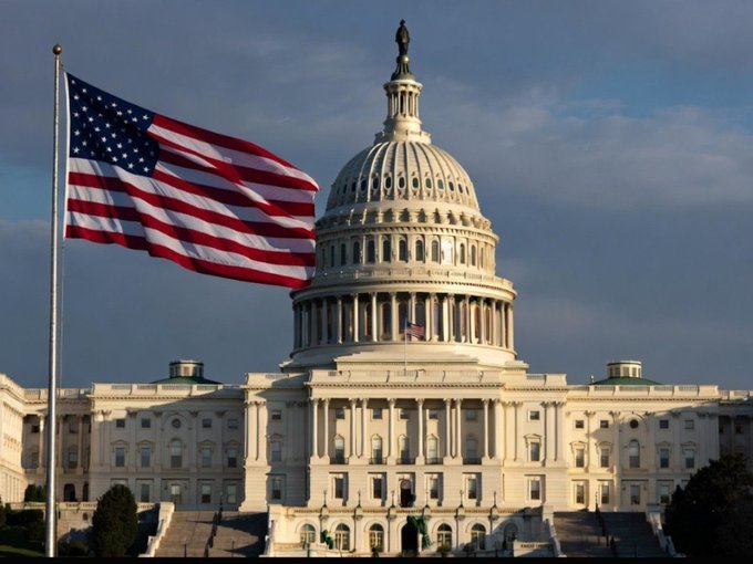 The image features a large white building with an American flag flying above it, which appears to be the United States Capitol Building. The caption reads "Crypto Clarity Act is about to pass & #XRP are ready for 1000X". This suggests that there might have been recent news or events related to cryptocurrency and the passing of the Crypto Clarity Act in the United States.

The image also includes a flag flying on top of the building, which further emphasizes its significance as an important government institution. The presence of the American flag indicates that the Capitol Building is located within the United States Capitol complex, where various government offices are situated.