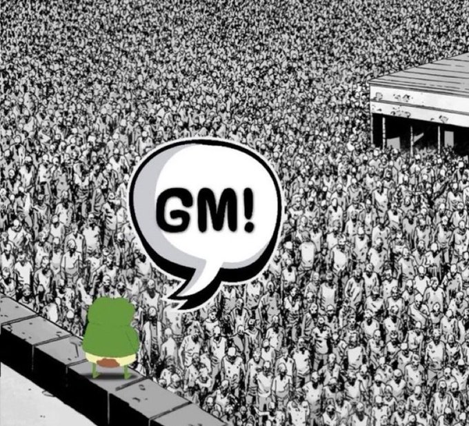 The image features a large crowd of people gathered for an event, possibly a sports game or concert. The crowd consists of numerous individuals standing close together, creating a sense of unity and excitement. In the center of this scene, there's a person wearing a green shirt with white text that reads "gm!". This individual is standing on top of a wall, surrounded by the crowd below them. The image also includes a speech bubble containing the words "gm!" written in bold letters above the person in the green shirt.