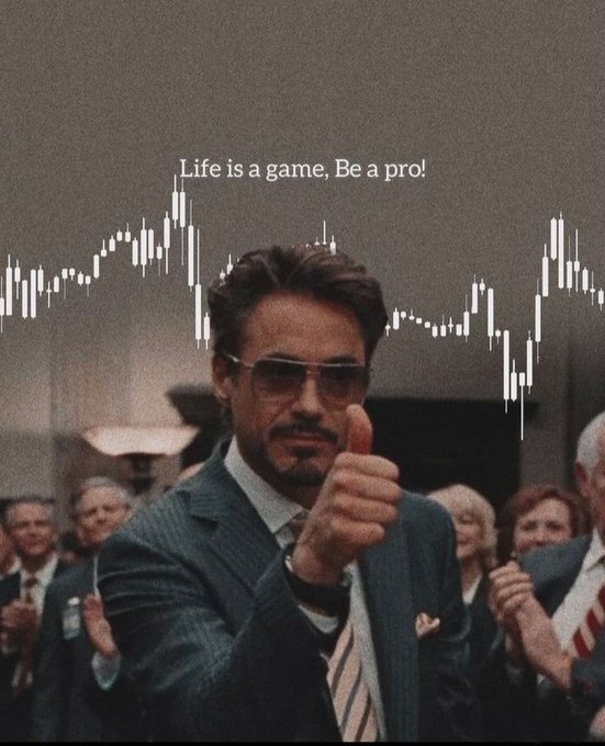 A motivational meme featuring Tony Stark giving a thumbs up with a stock chart and the text 'Life is a game, Be a pro!'