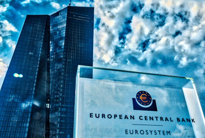 A dramatic low-angle shot of the European Central Bank (ECB) tower against a cloudy sky, with an "EUROPEAN CENTRAL BANK EUROSYSTEM" sign in the foreground. The accompanying post about Isabel Schnabel's Jackson Hole remarks on migrating central bank money to blockchain infrastructure ties directly to this image, as the ECB has been actively exploring digital euro and distributed ledger technology (DLT) initiatives—making the headquarters symbolic of the shift toward tokenized settlement and smart contract-based monetary infrastructure.