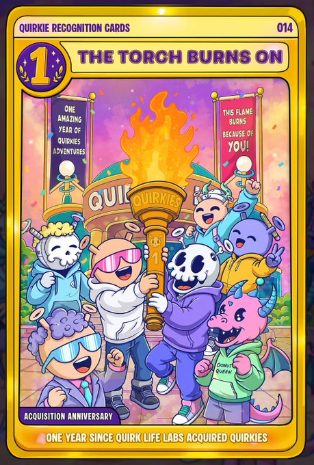 A 'Quirkie Recognition Cards' collectible card #014 titled 'THE TORCH BURNS ON' featuring cartoon characters celebrating an acquisition anniversary with text reading 'ONE YEAR SINCE QUIRK LIFE LABS ACQUIRED QUIRKIES'.