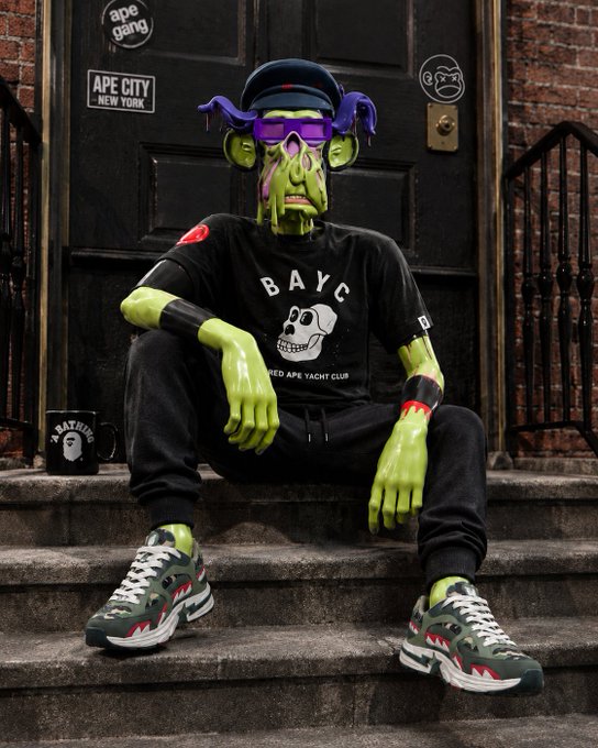 A 3D-rendered green-skinned Bored Ape character wearing a BAYC shirt, cap, sunglasses, and sneakers, sitting on steps in front of a door marked 'APE CITY NEW YORK'.