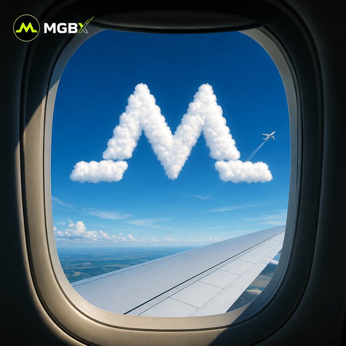 A view through an airplane window showing the wing and sky, with clouds arranged in an M-shape and a small airplane creating a contrail; the logo "MGBX" with a green triangle/M symbol appears in the top left corner.