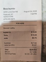 A Boss Burrito receipt from August 28, 2026, totaling $29.53 (including a $1.67 Bitcoin exchange-rate fee), humorously framing the purchase as a "buy and replace" Bitcoin-style investment.