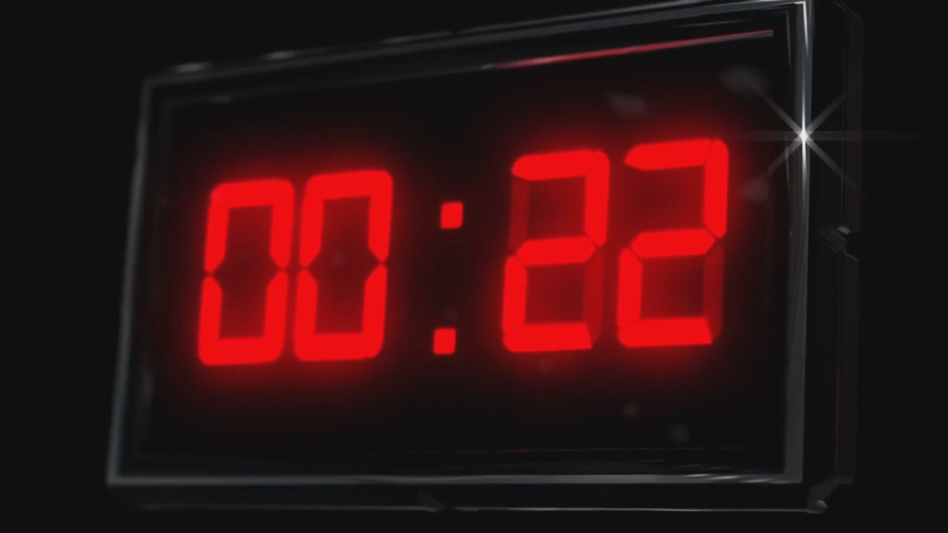 The image features a large, red digital clock with the time displayed as 00:22. The clock has a black frame that contrasts with its vibrant red display. Below the clock, there's text that reads "MARKET CRASH: TIME TO LOAD UP! $ASTER $HYPE $TROLL $UTYA". This message seems to be related to an event or situation in which people are encouraged to load up on a particular product or service.

The image is taken from a top-down perspective, with the clock as the main focus and the text below it providing additional information about the current situation.