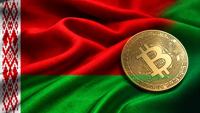 A golden Bitcoin coin rests atop the waving red and green flag of Belarus, symbolizing the country's emerging crypto banking sector as it registers its first digital asset institutions offering BTC and USDT services pending central bank approval.