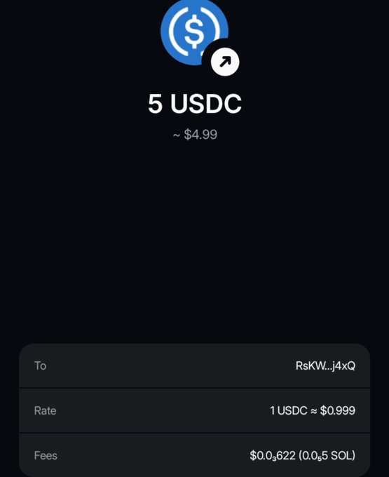 A digital wallet transaction screen showing a transfer of '5 USDC' (~$4.99) to the address 'RskW...j4xQ' with a fee of '0.0622 (0.05 SOL)'.