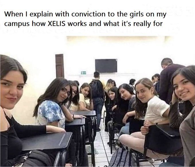 A classroom of smiling female students looking at the camera, captioned 'When I explain with conviction to the girls on my campus how XELIS works and what it's really for.'