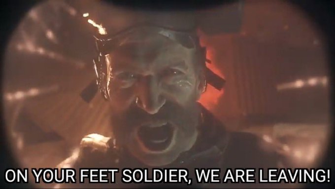 A dramatic scene from a sci-fi film showing a bearded man in distress with the caption 'ON YOUR FEET SOLDIER, WE ARE LEAVING!'