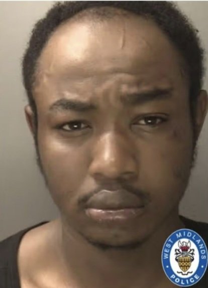 A mugshot of a man with a 'West Midlands Police' logo in the bottom right corner.