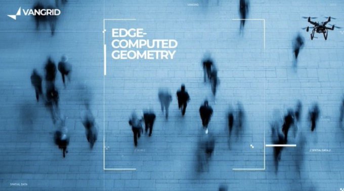 An aerial surveillance-style image with a blue tint showing blurred pedestrians walking on a plaza, labeled 'VANGRID' with the text 'EDGE-COMPUTED GEOMETRY' and a drone visible in the upper right corner.