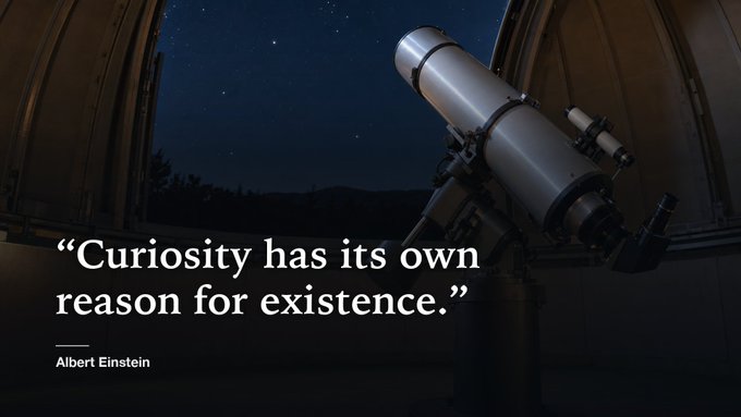 A telescope silhouetted against a starry night sky inside an observatory dome, overlaid with the quote 'Curiosity has its own reason for existence.' — Albert Einstein.