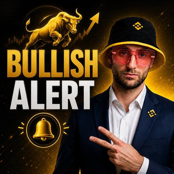 A man wearing a bucket hat and red-tinted sunglasses points confidently alongside bold "BULLISH ALERT" text featuring a charging gold bull and ringing bell graphic. The bullish imagery and upward momentum graphics directly reinforce the post's announcement of a new bullish trading setup for $LAB/USDT.