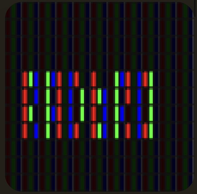 A dark image showing a pixelated LED-style display with red, green, and blue vertical bars forming a pattern.