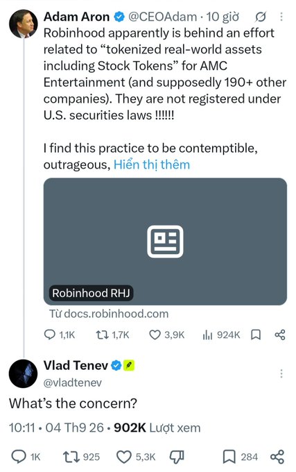 A social media post by Adam Aron (@CEOAdam) criticizes Robinhood for tokenized real-world assets like AMC Entertainment stock tokens that aren't registered under U.S. securities laws, followed by Vlad Tenev (@vladtenev) replying 'What's the concern?'