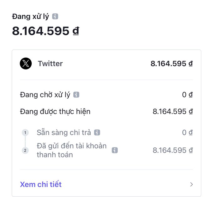 A payment status screen in Vietnamese showing a pending Twitter transaction for 8,164,595 đ, with the funds already sent to the payment account.