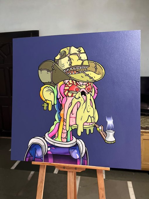 A colorful painting on a blue canvas depicts a surreal, melting character wearing a yellow hat and smoking a pipe, displayed on a wooden easel.