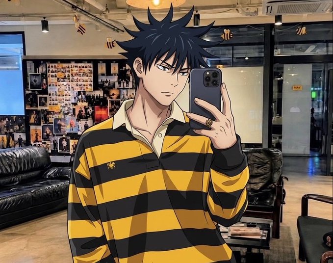 Anime-style character (resembling Fushiguro Megumi from Jujutsu Kaisen) wearing a yellow and black striped shirt, taking a mirror selfie with an iPhone in a room with leather couches.