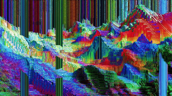 iced coffee with a colorful foam design, featuring a mountain range and rainbow-colored stripes against a light gray background.