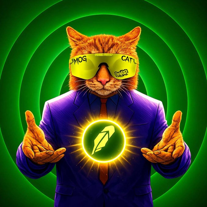An anthropomorphic orange cat wearing a purple suit and neon green "MOG CAT" sunglasses summons a glowing feather quill coin between its hands against a hypnotic green spiral background, visually hyping the launch of the $MOG token on Robinhood. The image's mystical, money-magnet aesthetic amplifies the post's celebratory tone about gambling a "bag" on the newly listed token, with the feather symbol perhaps hinting at the "Pen" or a bullish omen for the trade.