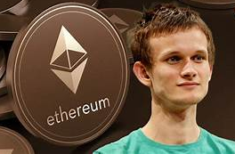 A young man in a teal shirt stands in front of large backdrop featuring the Ethereum logo and the text "ethereum," appearing to be Vitalik Buterin, the co-founder of Ethereum. The image relates to the post about Vitalik updating Ethereum's roadmap to prioritize quantum computing protection and security by 2029.