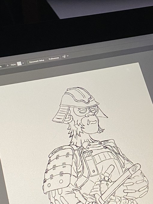 A digital drawing of a samurai-like character wearing a helmet and armor is displayed on a computer monitor, with the Photoshop interface visible showing "Document Setup" and "Preferences" menus.