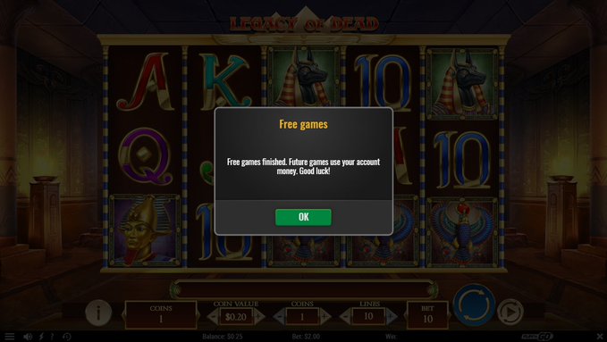 A 'Legacy of Dead' slot machine game screen displaying a 'Free games finished' popup message with an OK button, showing an Egyptian-themed slot interface.