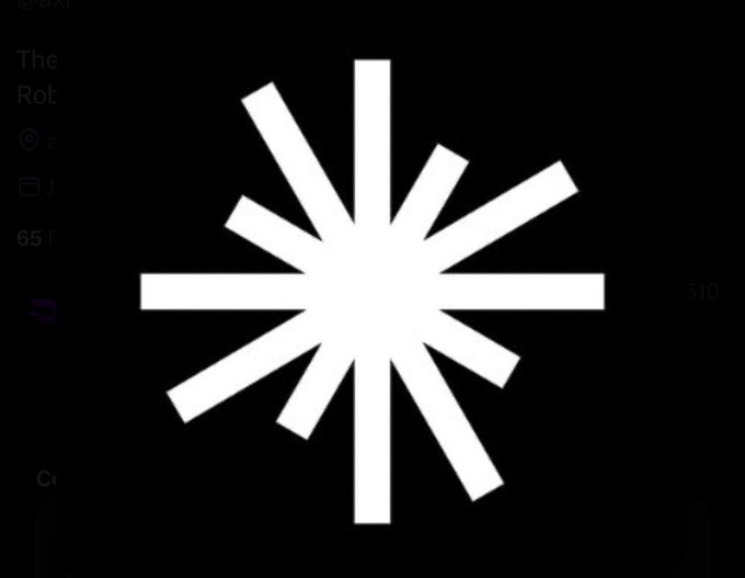 A white asterisk or starburst logo on a black background, resembling the loading animation of an AI chatbot interface.