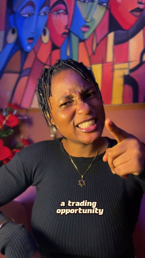 A woman with braided hair and a Star of David necklace points at the camera with a confident expression, standing in front of a vibrant cubist-style painting. The caption "a trading opportunity" appears on her black shirt, tying into the post's promotion of a free 30-day trading class covering fundamentals, technicals, futures, crypto, and risk management.