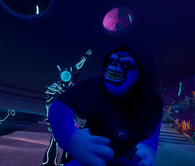 A 3D rendered scene featuring a menacing gorilla character in a dark robe with glowing blue neon details, accompanied by a small robotic figure with a cyan sphere, set against a dark sci-fi background.