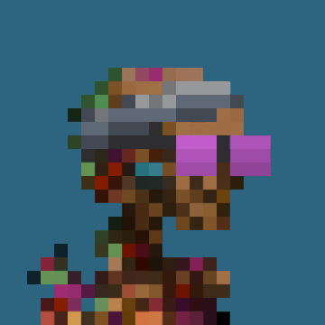 A low-resolution pixel art image shows what appears to be a stylized character or NFT figure against a blue background, likely one of the "Argonauts" minted. The blocky, abstract figure has a rounded top resembling a helmet or head with vibrant pink, purple, and multicolored details on the body, fitting the pixelated NFT aesthetic associated with the Argonauts collection the user just minted.