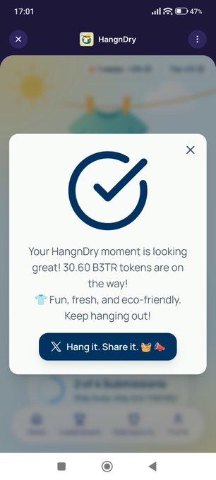 The image shows a phone screen with a button that says "hangit share it" and another button that reads "keep it out", both of which are located in the bottom left corner. Additionally, there's a message from HangnDry congratulating someone on earning 30.6 #B3TR by drying their laundry using eco-friendly methods.