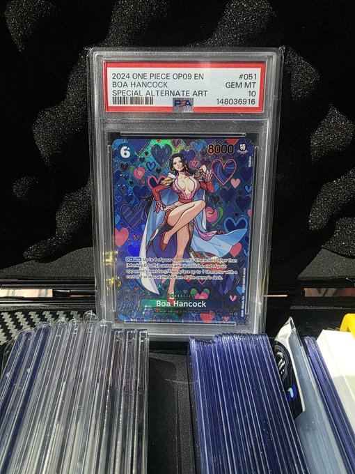 A PSA 10 graded 2024 One Piece OP09 EN trading card featuring Boa Hancock in special alternate art, displayed in a protective case on a foam mat.