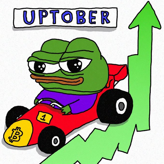 A cartoon Pepe the Frog driving a red Formula 1-style race car with a Bitcoin logo, going up a green arrow, with the text 'UPTOBER' displayed at the top.