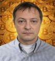 A photo of Elon Musk in front of a Bitcoin background.